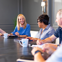 happy and satisfied board meeting with developers and homeowners