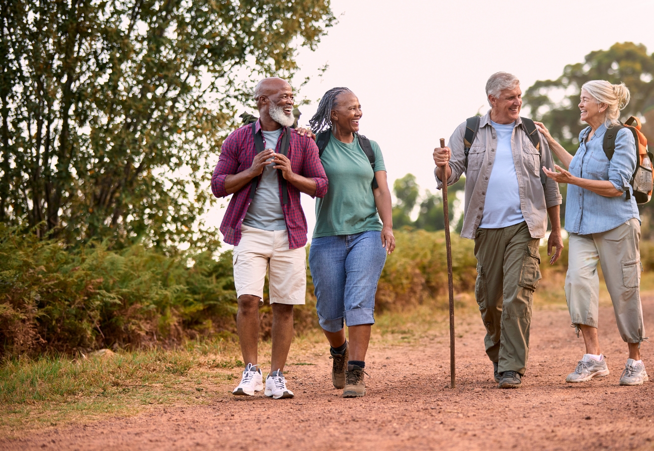 group of people walking on a trail | Leading Master-Planned Communities in Utah | FirstService Residential