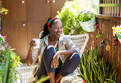 woman sitting on chair considering Florida condo insurance