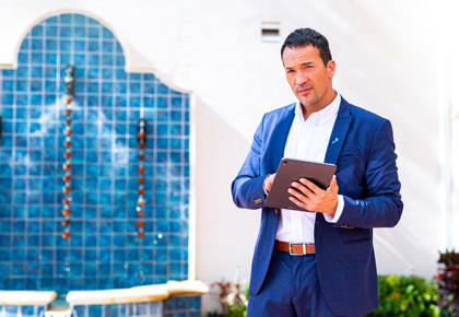 A community association manager surveys the property