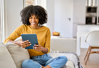 woman reviewing the north carolina condominium act on mobile device