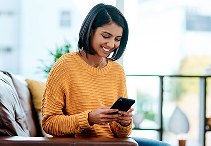 woman reviewing community guidelines on her phone