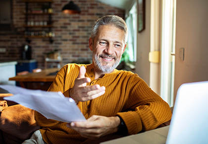 man reviewing texas condo insurance options