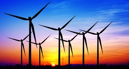 Windmills and sunset, benefit of renewable energy